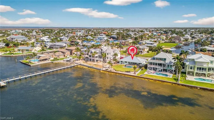 Aerial view of residential area with a large body of water