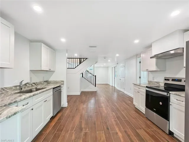 New Kitchen with Granite countertops, stainless steel appliances, white cabinets with soft close doors and drawers