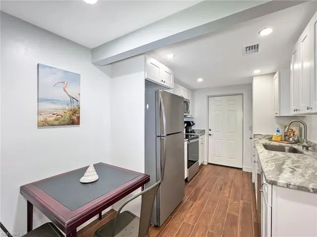Kitchen nook with table and chairs