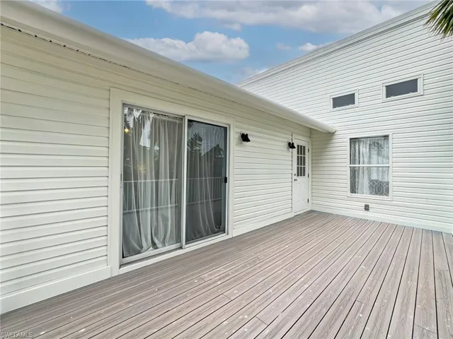Upper Level Open Balcony off Bedroom with composite Decking