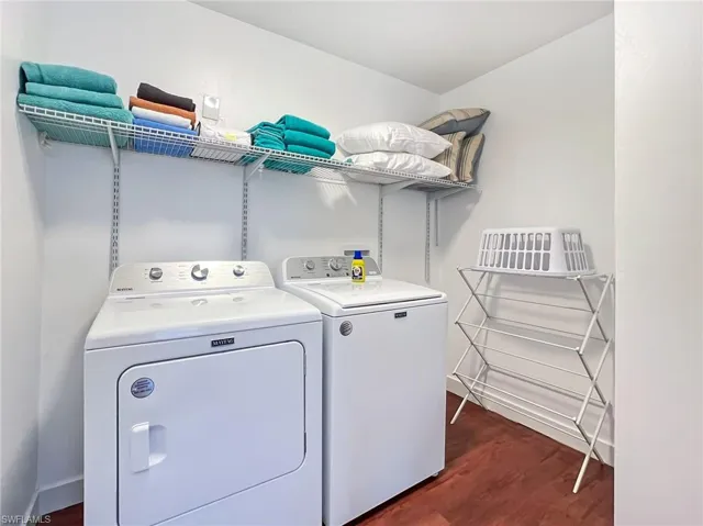 Spacious Laundry room with washer and clothes dryer