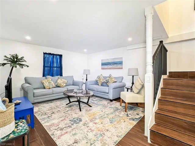 Living room and steps featuring Ceramic flooring