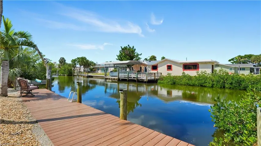 Dock area with Gulf access canal view- Virtually Edited Image