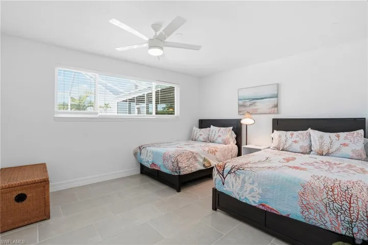 Guest bedrooms with plenty of room for two beds- Virtually Edited Image