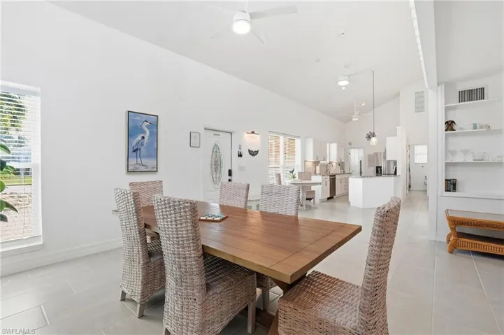 Dining area and high vaulted ceiling- Virtually Edited Image