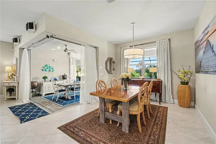 Spacious room with large tile flooring and neutral wall tones