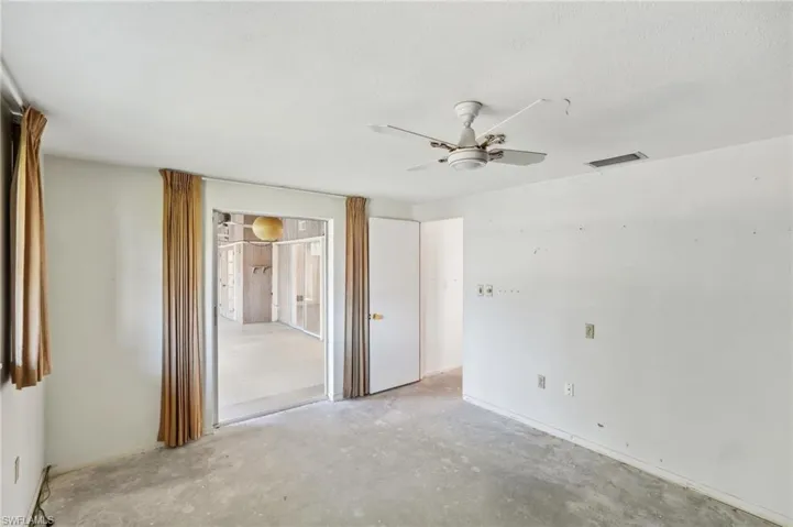 Unfurnished room with ceiling fan