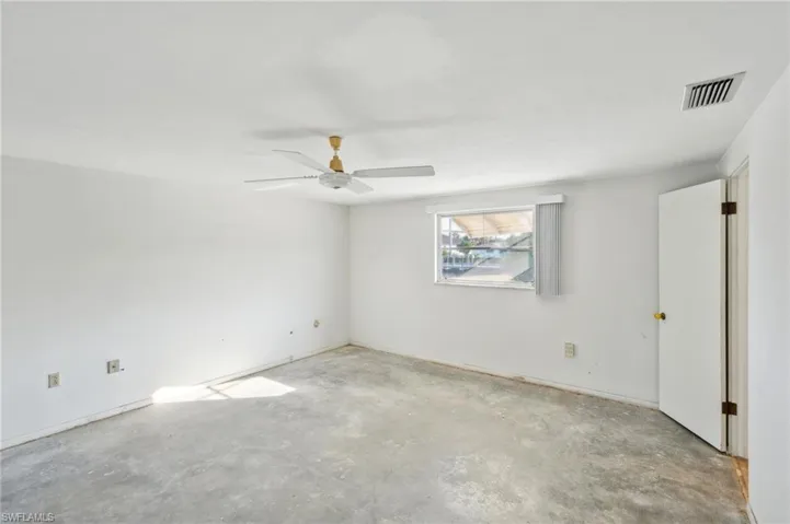 Unfurnished room with ceiling fan