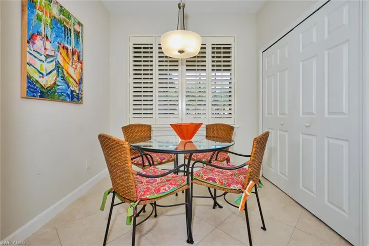 Tiled dining area with baseboards