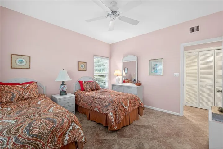 Bedroom featuring baseboards and a ceiling fan