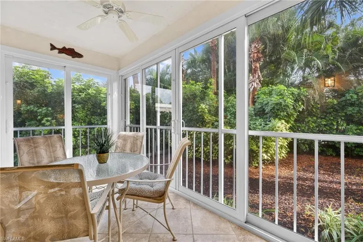 Sunroom featuring tile patterned flooring