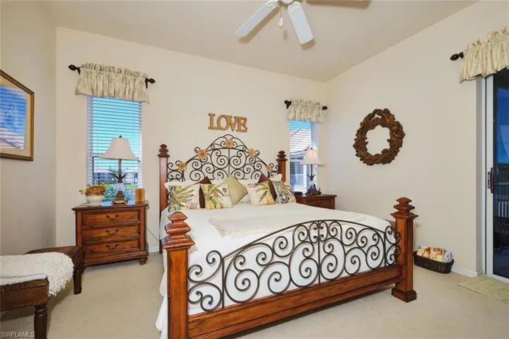 Bedroom with carpet floors and a ceiling fan