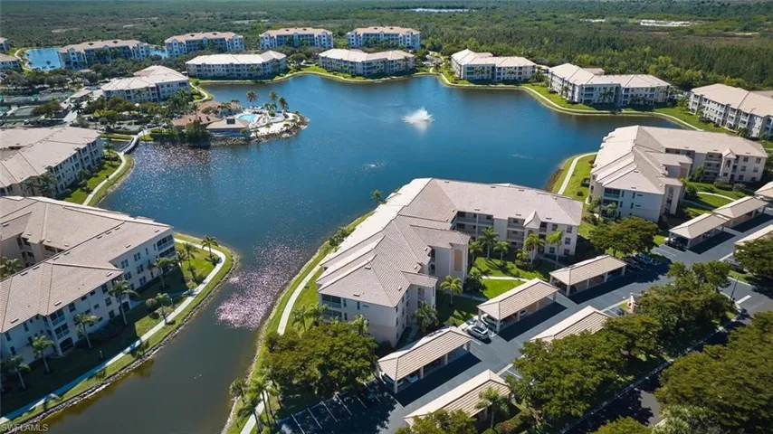 Aerial view of property's location featuring a large body of water