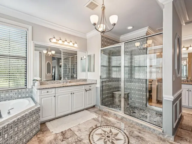 Upstairs - primary bathroom with separate vanities