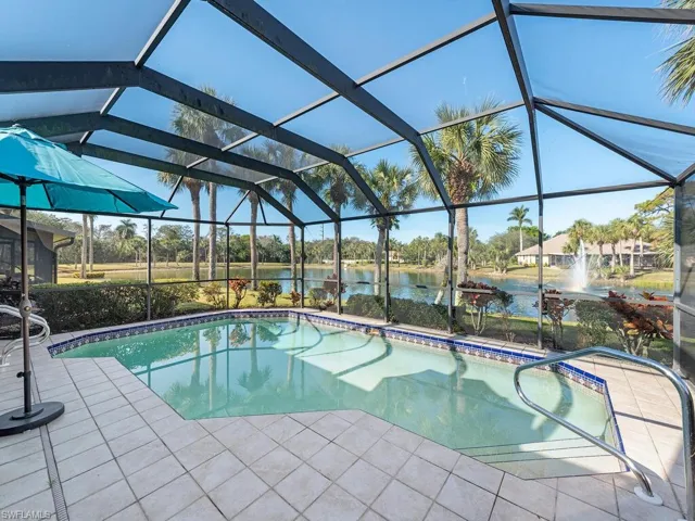 Private pool with a lake and  fountain view