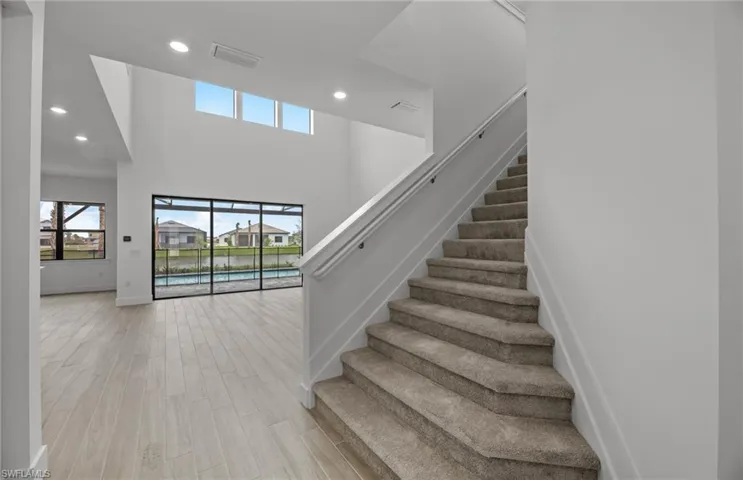Beautiful stairway to 2nd floor near gathering area