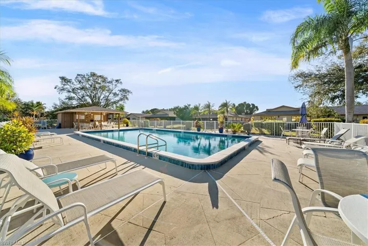 Community pool featuring a patio area
