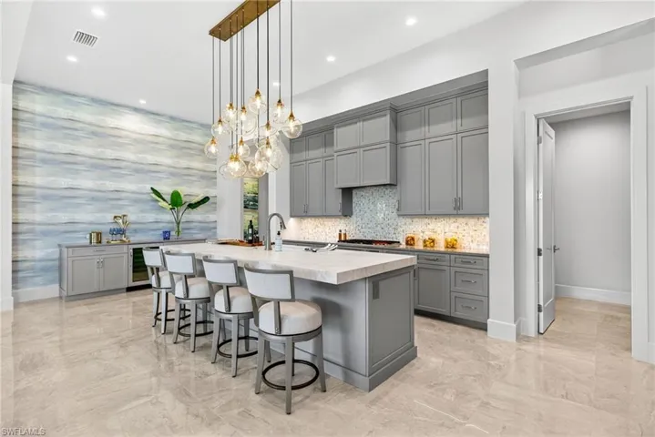 Kitchen with built-in wine/dry bar