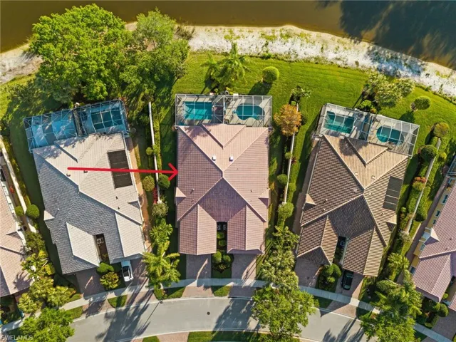Expansive oversized homesite with long lake views and exceptional privacy—rare for villa living.