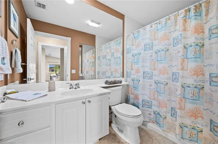 Stylish guest bath with clean finishes and convenient access for visitors.