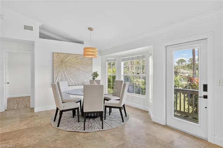 Front Entry with Formal Dining Area. Tons of natural lighting.