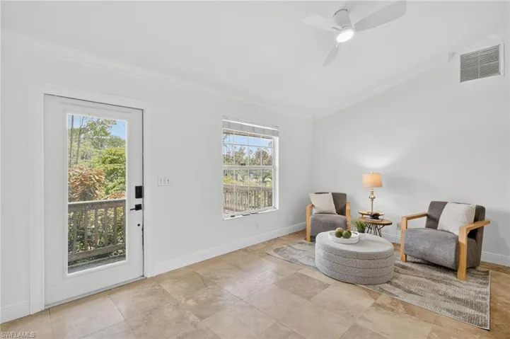 Front Entry with Formal Seating Area. Tons of natural lighting.