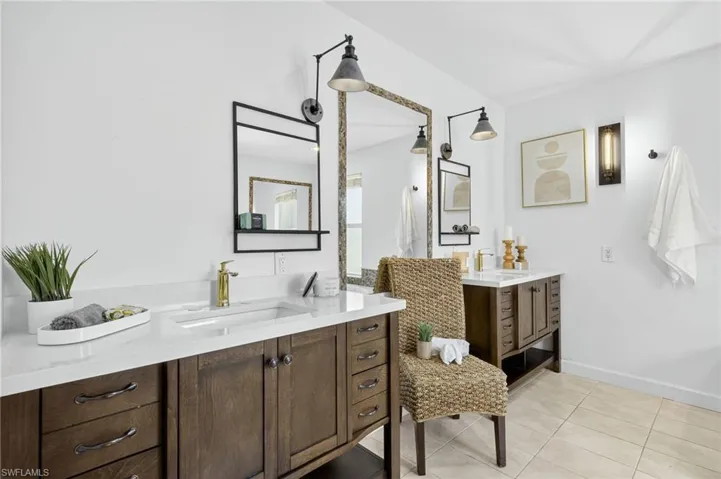 Master bathroom with dual sink, large jetted tub with a separate shower