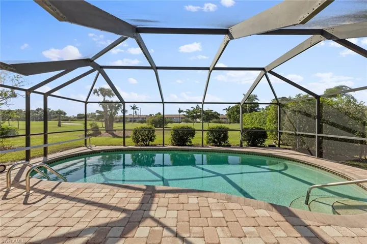 View of pool featuring a lanai and a patio area