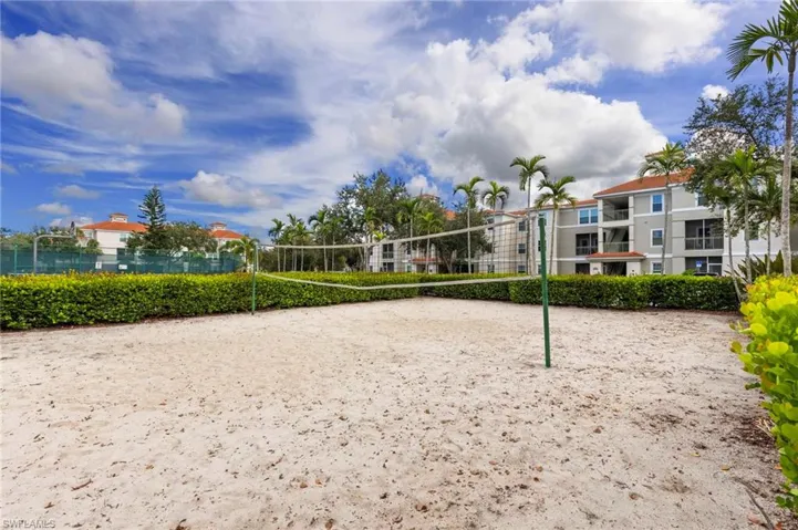 View of home's community with volleyball court