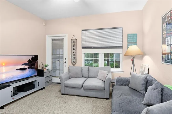Living room featuring carpet
