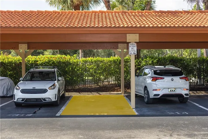 Property conveys with a carport parking spot plus an additional (uncovered ) spot