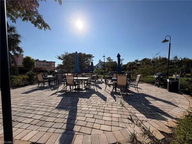 View of patio with outdoor dining area