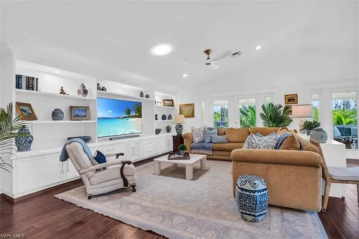 Custom lighted built-ins in living room.