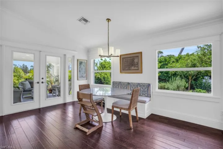 Eat in area with impact French doors.