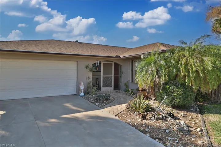 Ranch-style house with a garage