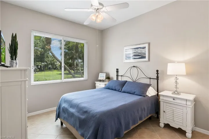 Bedroom featuring ceiling fan and light tile patterned floors