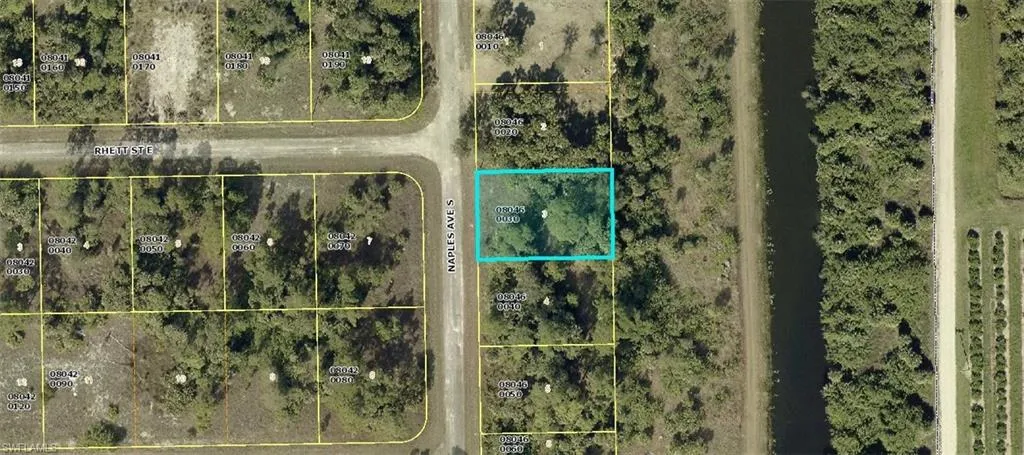 Aerial map of property and surrounding area with property parcel outlined