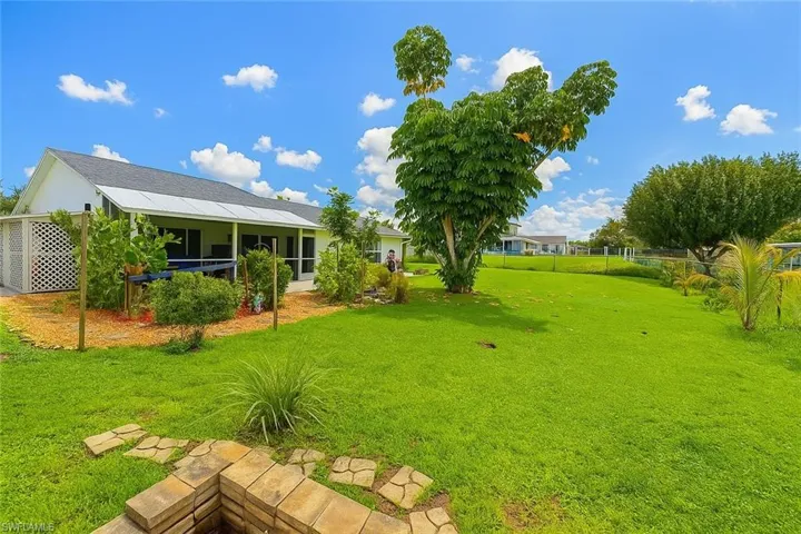 View of spacious, fenced yard