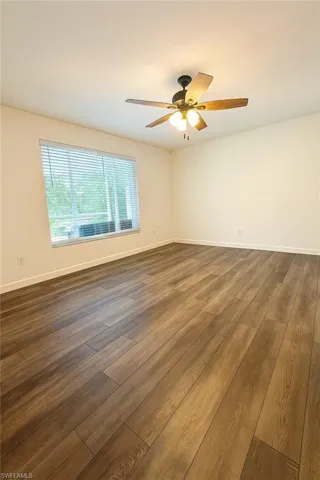Primary Bedroom featuring ceiling fan and LVP floors