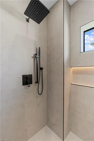 Bathroom with a tile shower