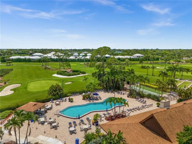Aerial perspective of suburban area featuring a golf club