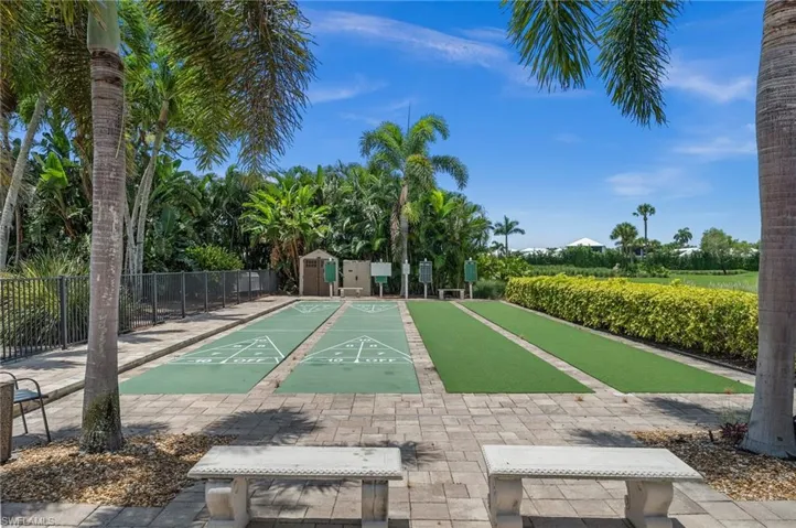 View of community featuring shuffleboard