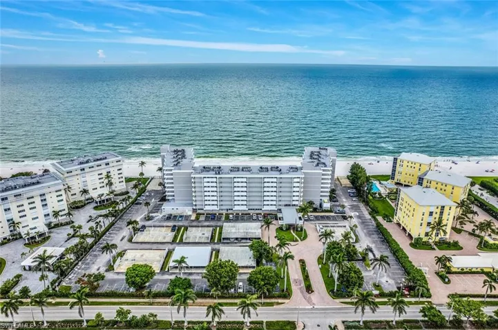 Bird's eye view of a nearby body of water and apartment complex