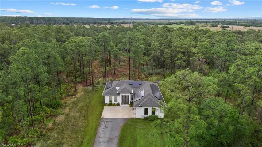 Aerial view with a wooded view