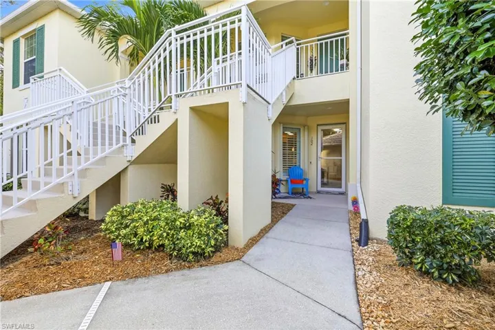 View of exterior entry featuring stucco siding