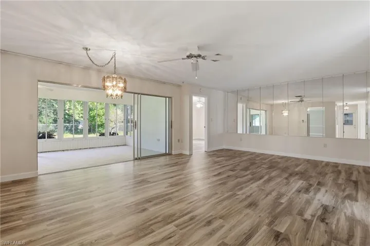 Spacious dining area perfect for gatherings, located just off the kitchen for easy entertaining.