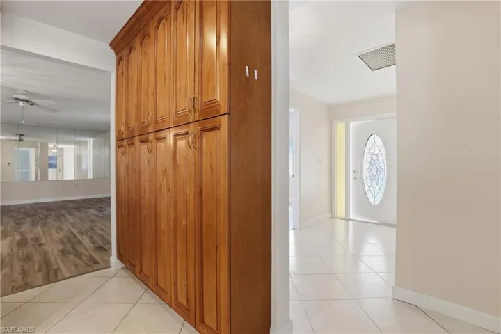 The kitchen boasts abundant storage space, offering plenty of room for all your cookware and essentials.