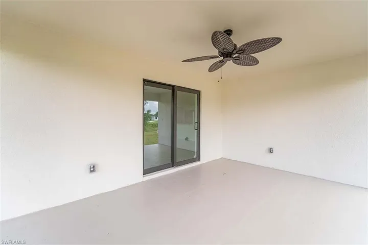 View of patio featuring ceiling fan