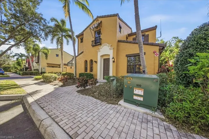 Mediterranean / spanish house with stucco siding and a tiled roof