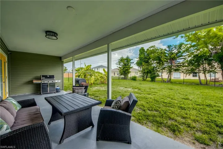 View of patio / terrace featuring a grill and an outdoor living space